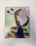 A whimsical watercolor shows a coiled snake standing upright in a long blue dress, its body patterned in browns, oranges, and cream. The snake wears a collar with two curved, star-tipped extensions and holds a wand with a dandelion-like puff and small star in its tail. The background is a soft pastel wash of green, pink, and blue, and the piece is set within a white mat.